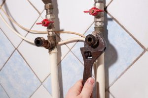 Unscrewing plumbing fittings on water pipeline Kennesaw, GA