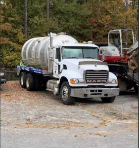 Septic Tank Truck Parked at a Client's Property