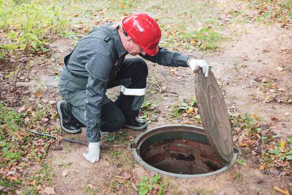 septic tank being inspected