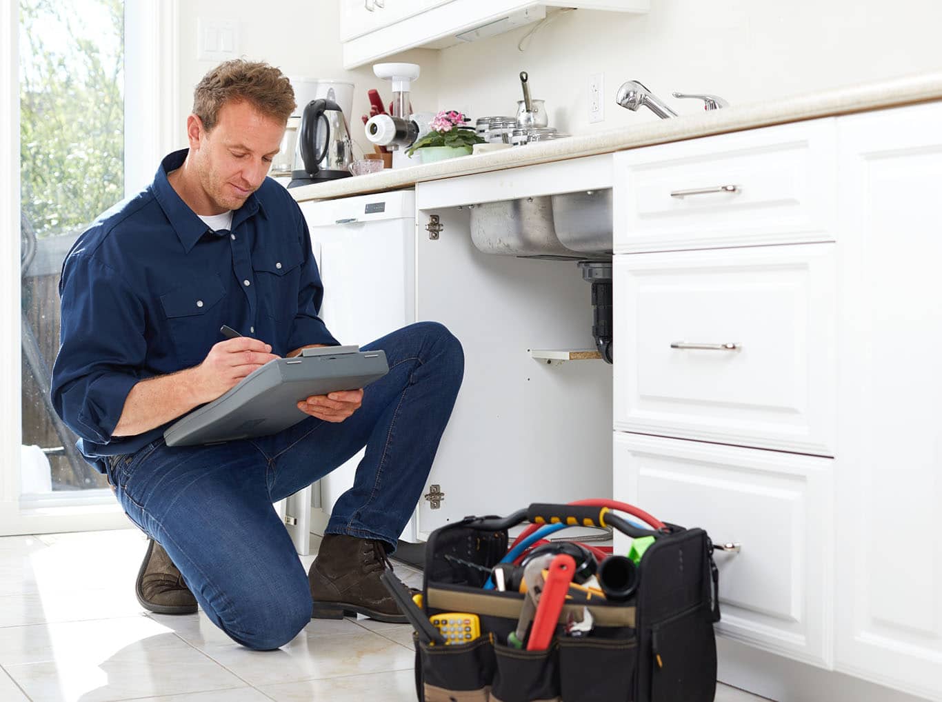 Kennesaw plumber performing an inspection